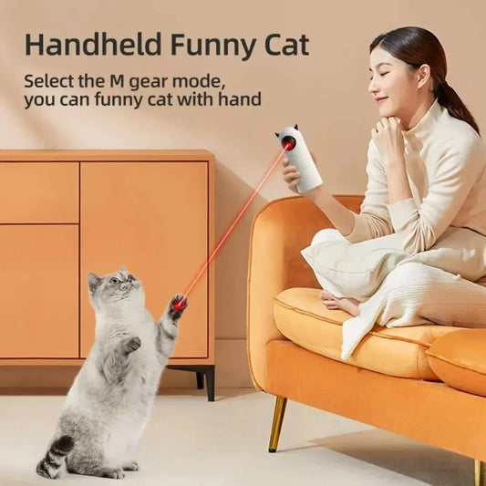 Cat chasing laser dot from automatic interactive cat toy